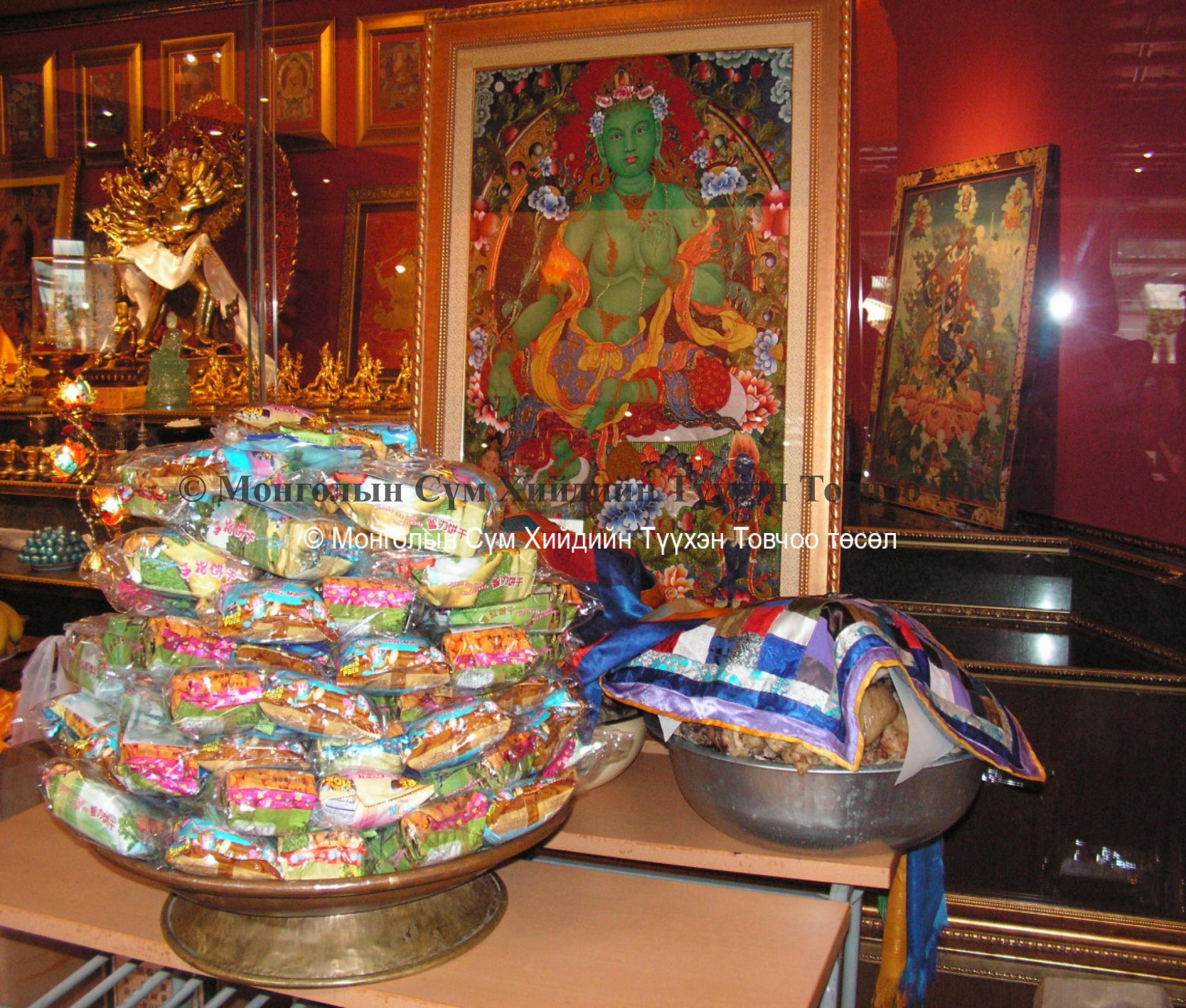 Offering on the altar in front of Green Tara